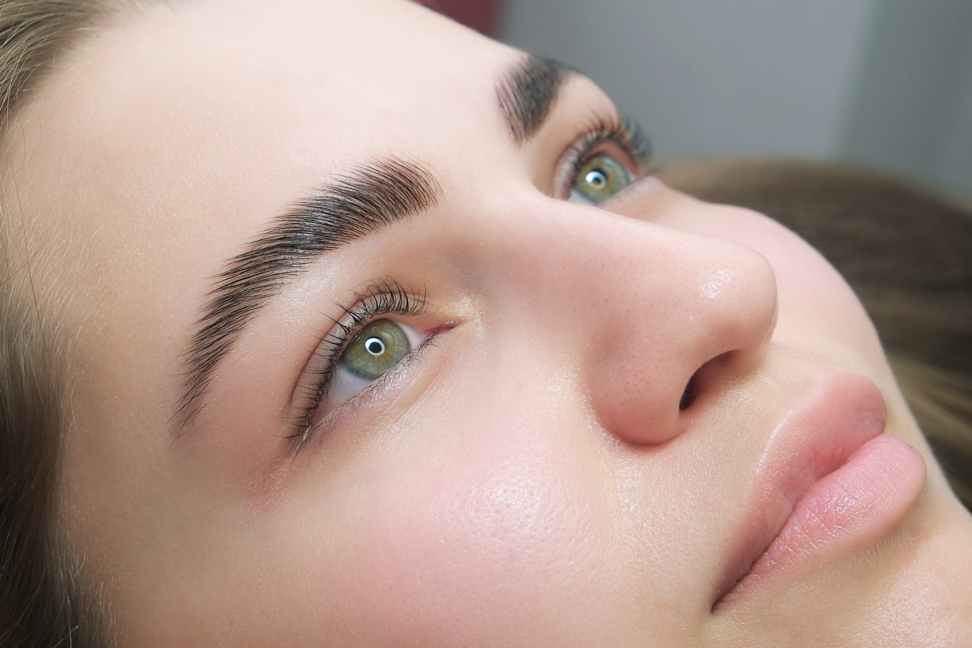 Close up portrait of woman getting beauty procedures in spa salon